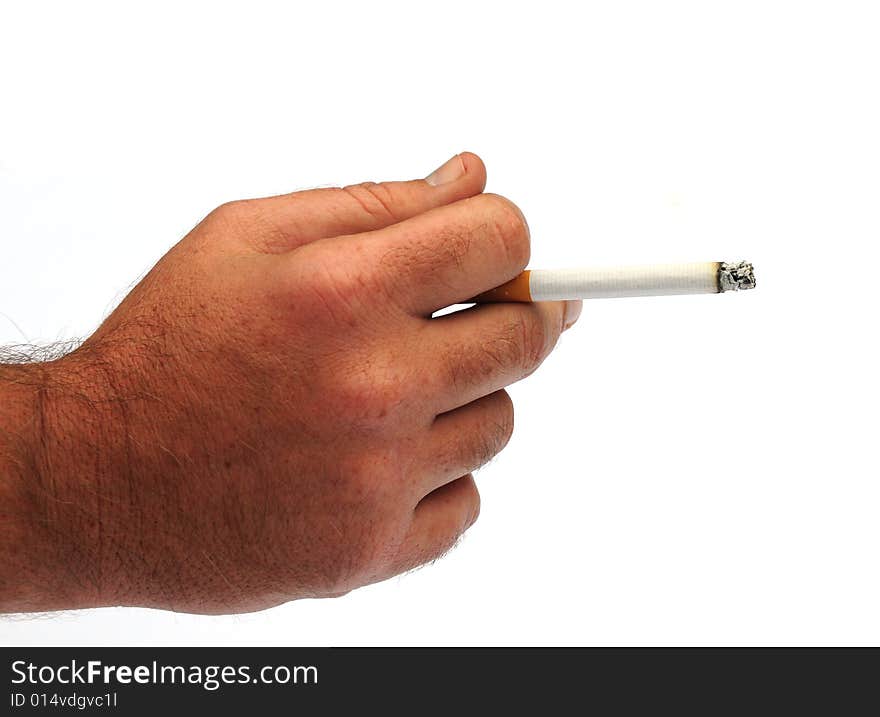 Shot of a hand holding a cigarette. Shot of a hand holding a cigarette