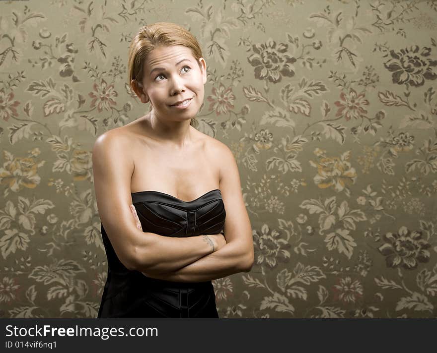 Pretty Ethnic Woman in front of a Flowered background