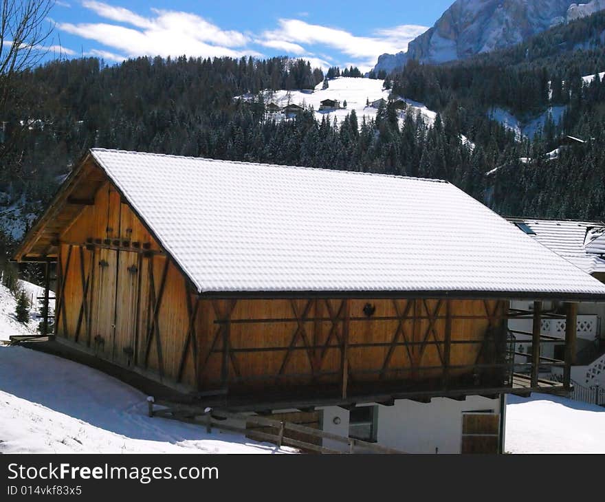 A beauiful shot of a mountain's cottage in Dolomiti