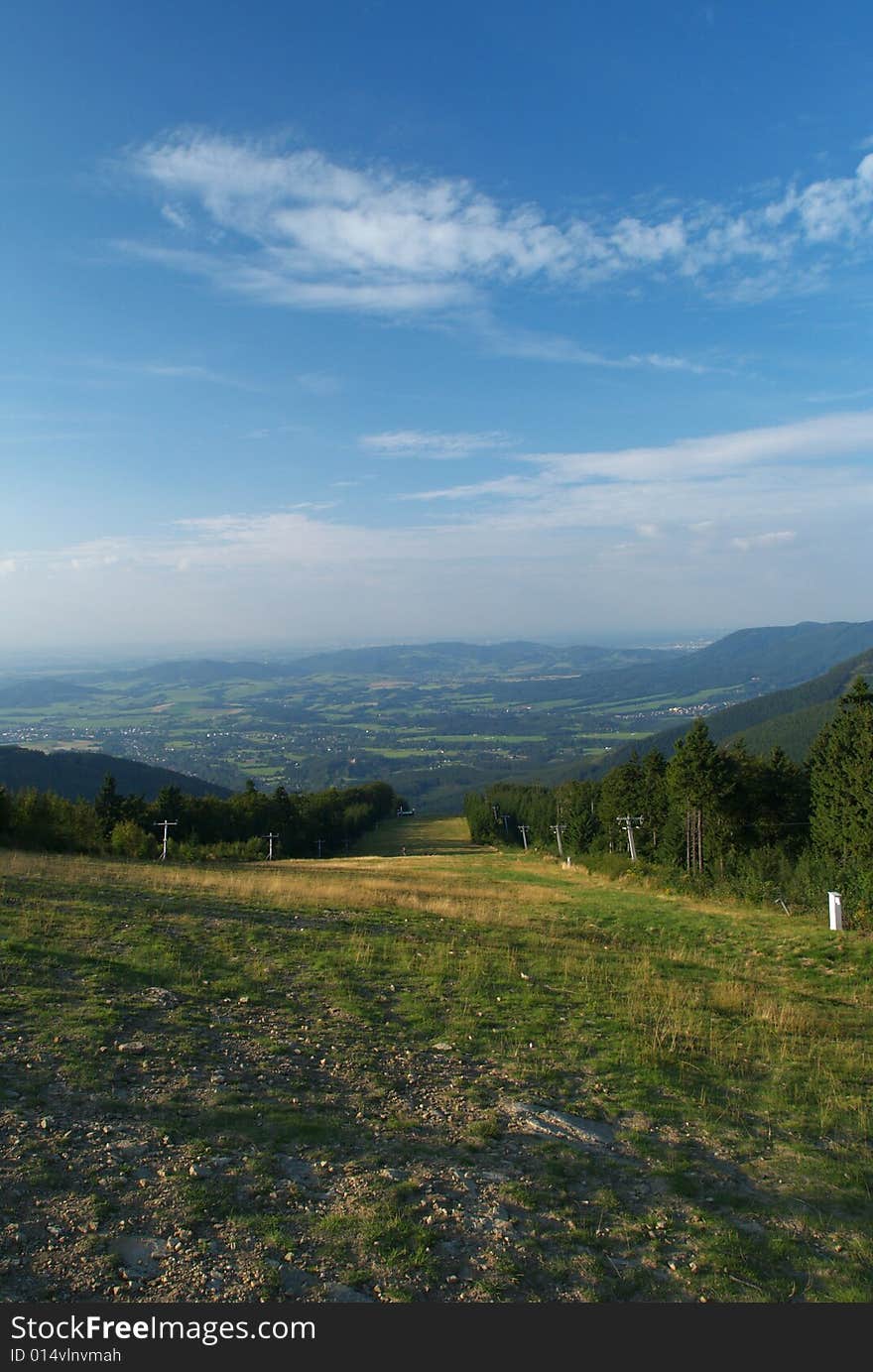 Ski slope in summer day