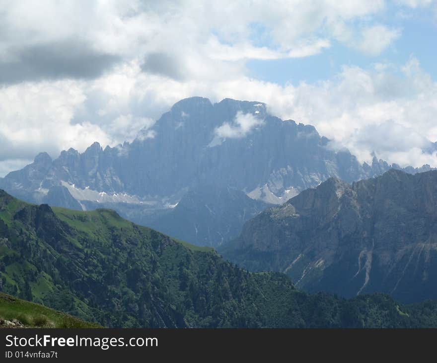 Mountain view of the dolomites during summer on a cloudy day. Mountain view of the dolomites during summer on a cloudy day