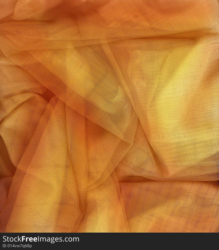 Orange and gold netting fabric perfect for a background. Orange and gold netting fabric perfect for a background.