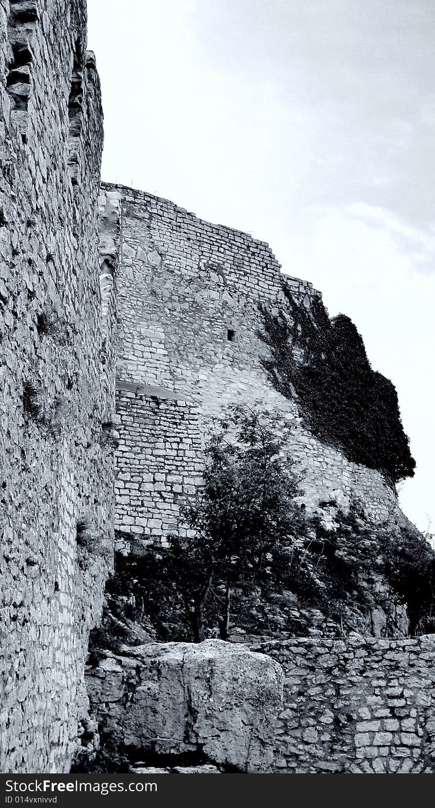 Castle Hohennneuffen, a medieval knights' ruin at the boarder of the Swabian Alb mountains, 15 miles southeast from Stuttgart. Baden-Wuerttemberg, Germany. B/W version in rather dramatic exposure settings. Castle Hohennneuffen, a medieval knights' ruin at the boarder of the Swabian Alb mountains, 15 miles southeast from Stuttgart. Baden-Wuerttemberg, Germany. B/W version in rather dramatic exposure settings.