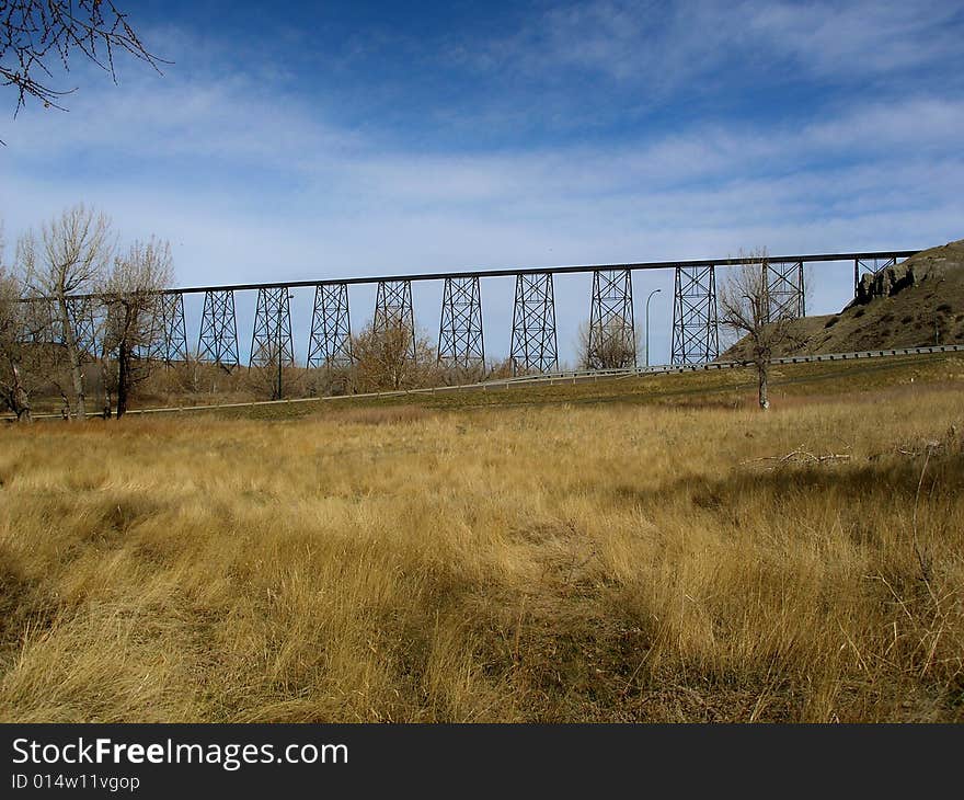 High Level Bridge spans 1.6 km and towers 100meters above the Oldman River Valley-the longest and highest trestle-construction bridge in the world.