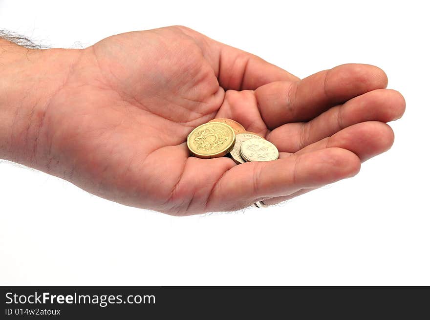 Hand holding British currency