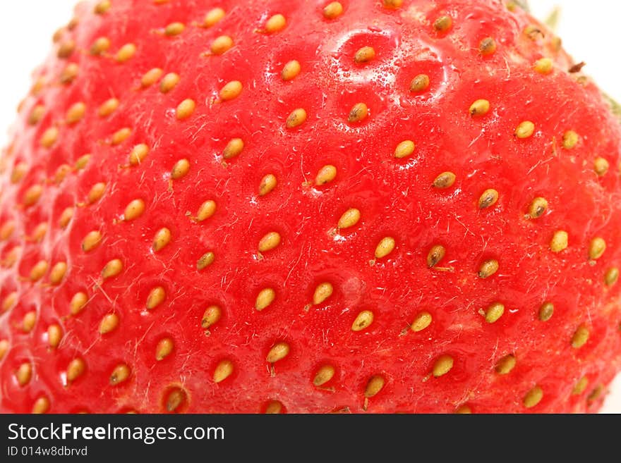 A strawberry isolated with a white background.