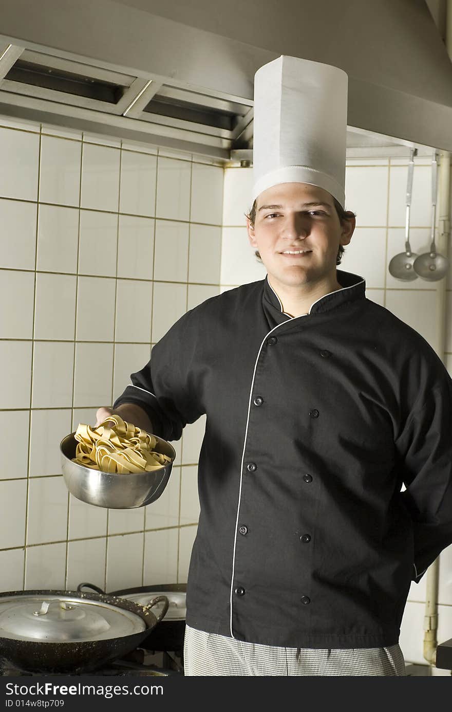 Chef Holding Noodles