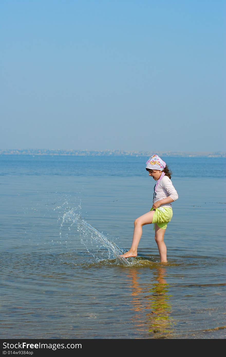 Child do splash on river. Child do splash on river