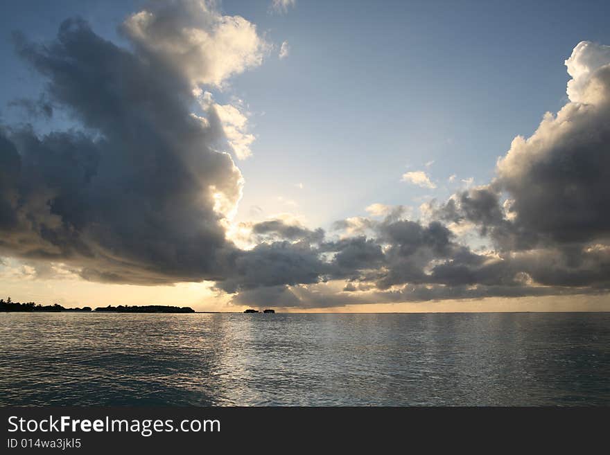 Sunset and V shape clouds in Maldives