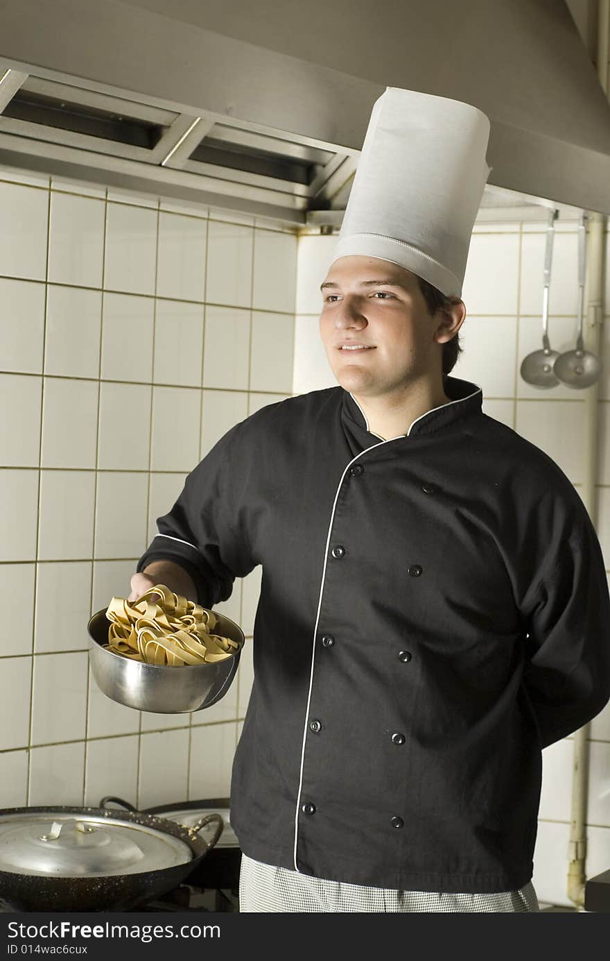 Chef Holding Noodles