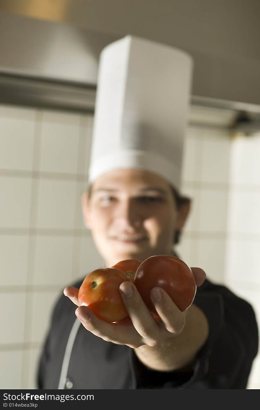 Chef with Tomatoes - Vertical