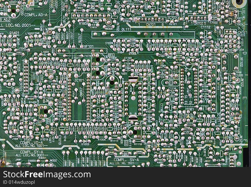 Old and oxidized microcircuit board. Close-up. Texture.