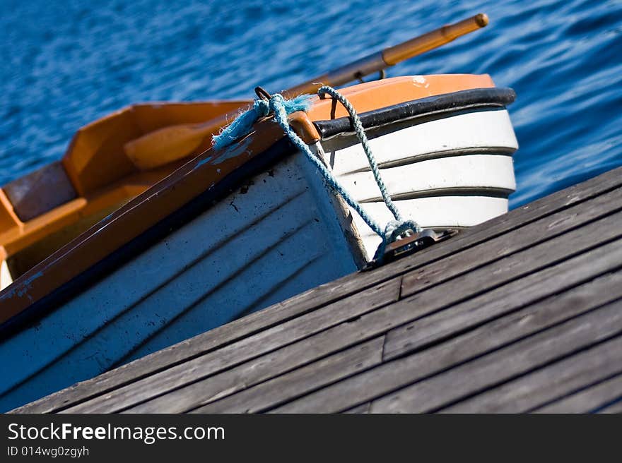 Orange and white rowing boat. Orange and white rowing boat