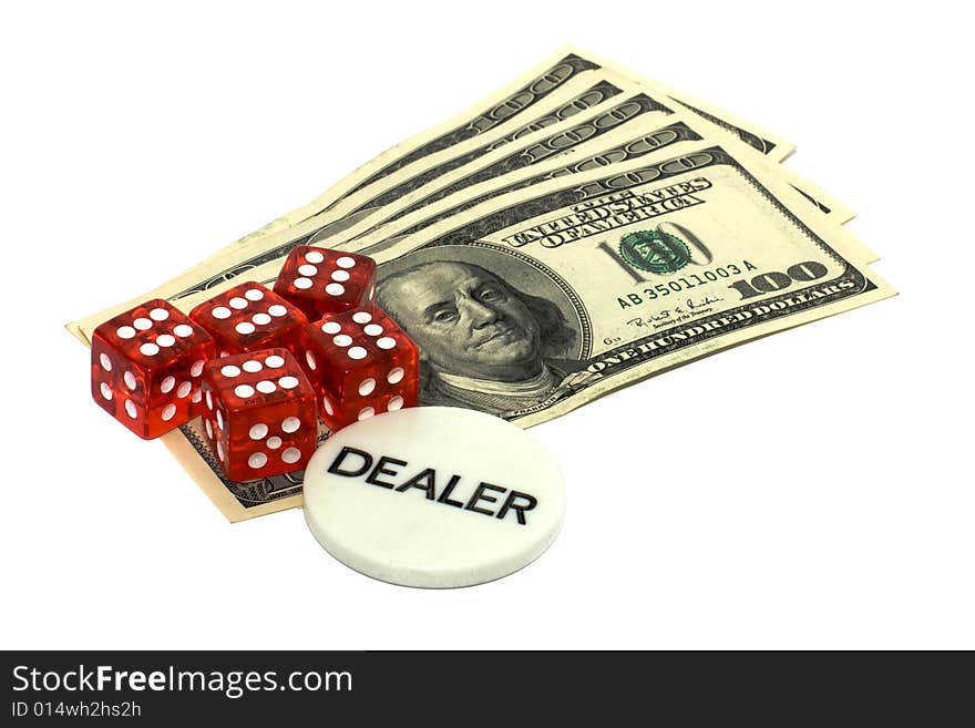 Dealers token, dice and dollars.