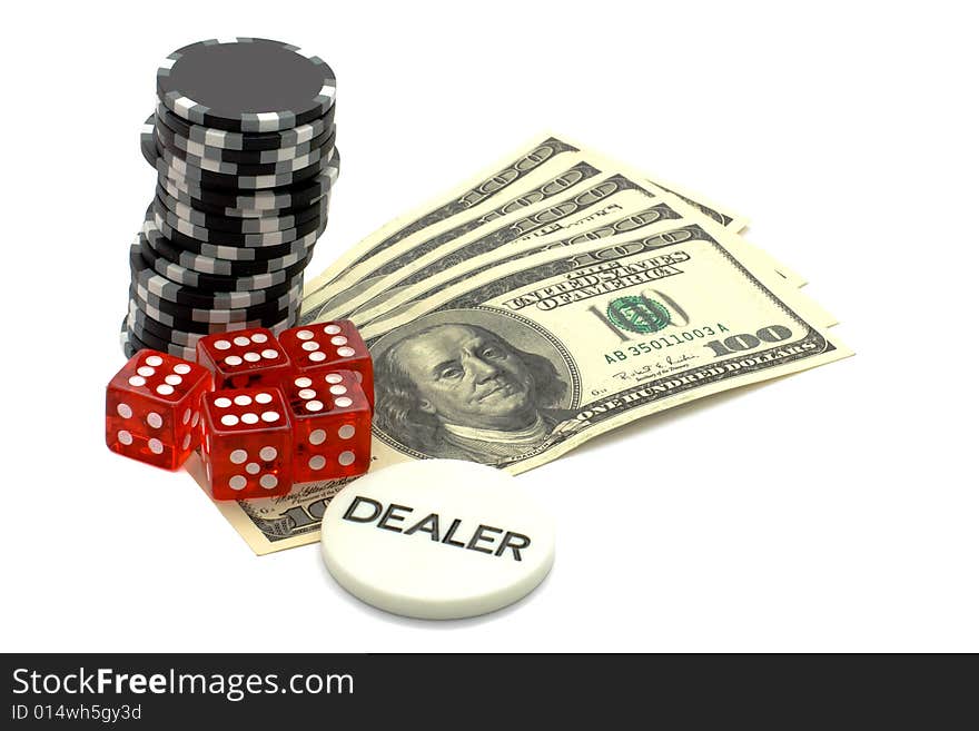 Dealers token, dice and dollars.