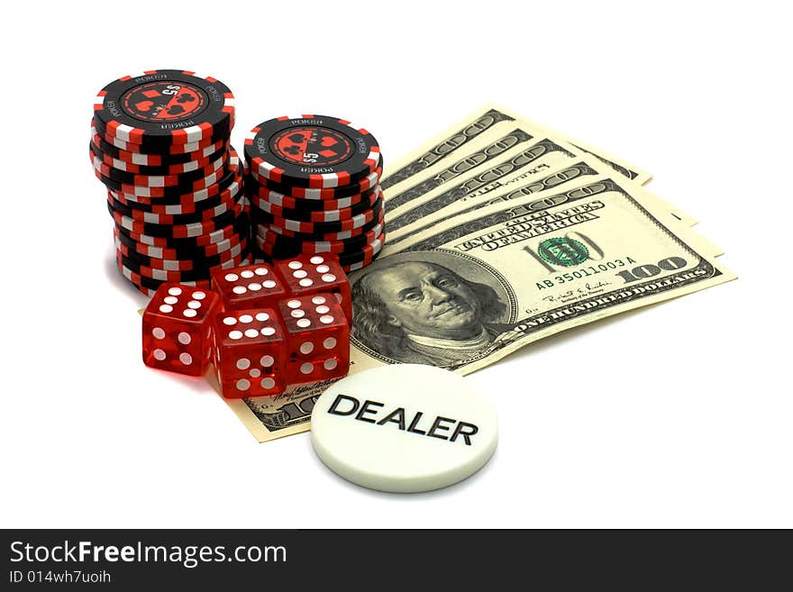 Dealers token, dice and dollars.