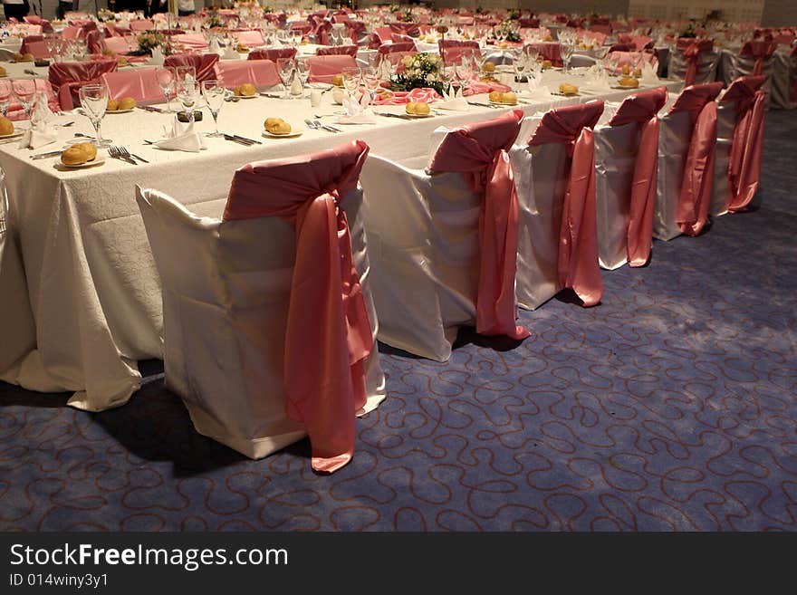 Many chairs and flowers in a ballroom for weddings. Many chairs and flowers in a ballroom for weddings