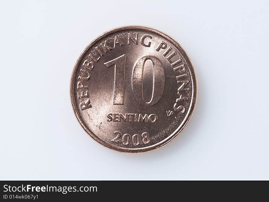 Ten-centavo Philippine coin on white background