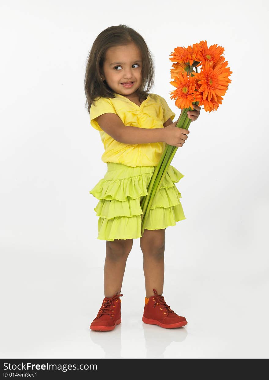 Girl holding Gerbera flowers