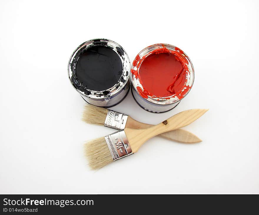 Paintbuckets and brushes isolated over white background, painting equipment.