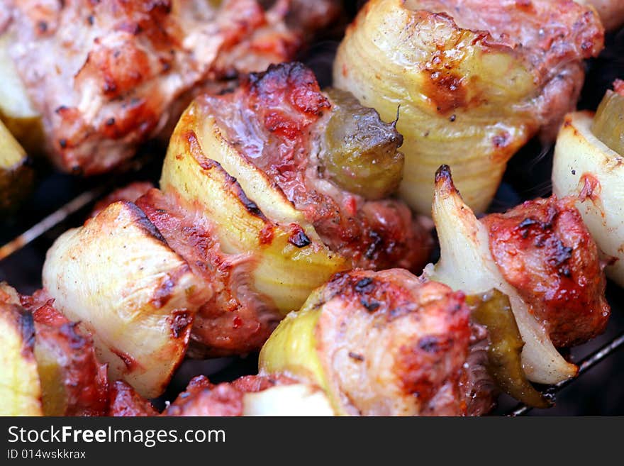 Sizzling barbecue sticks with meat and vegetables. Sizzling barbecue sticks with meat and vegetables