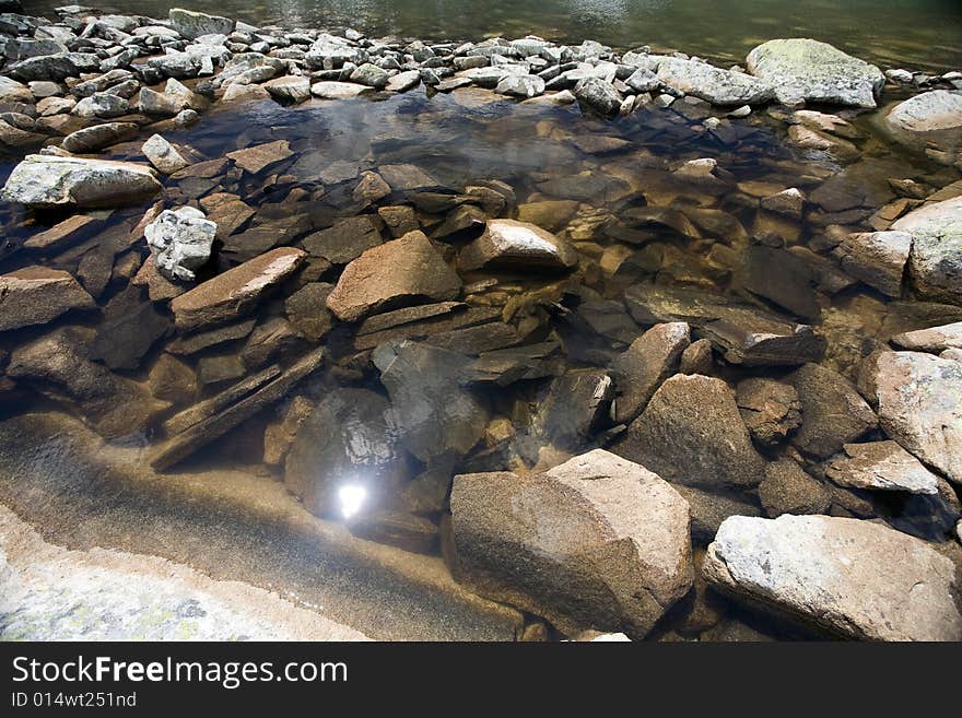 Lake in high mountains of Altai, summer