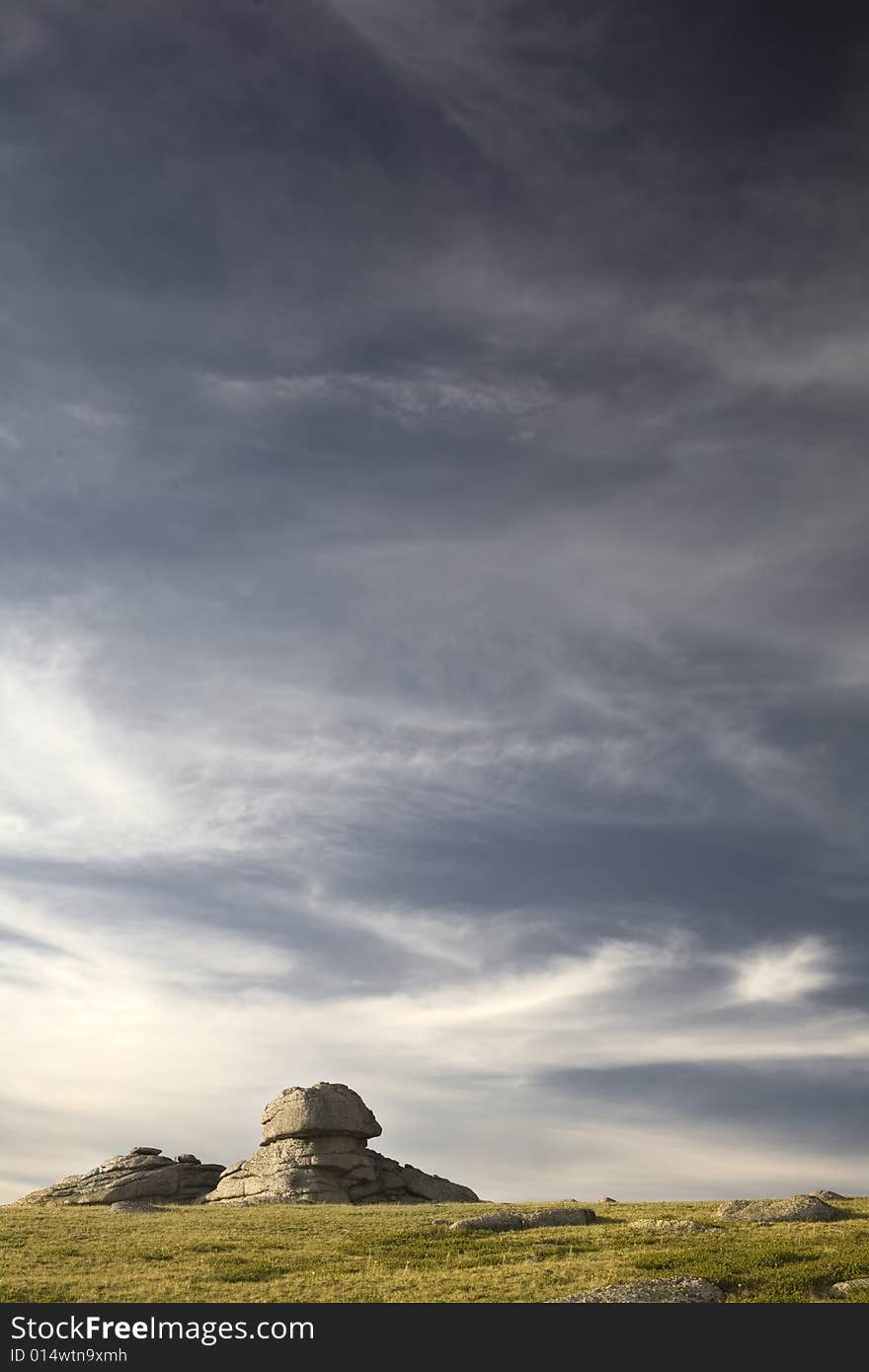 High mountain's rocks, summer, sky and clouds. High mountain's rocks, summer, sky and clouds