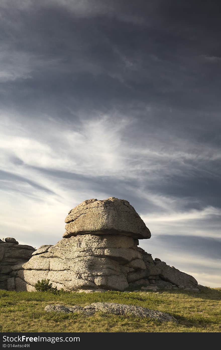 High mountain's rocks, summer, sky and clouds. High mountain's rocks, summer, sky and clouds