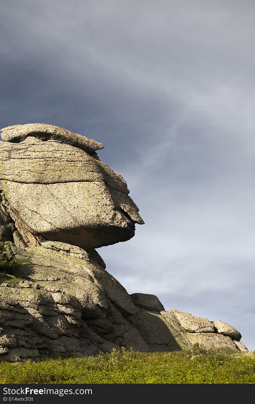 High mountain's rocks, summer, sky and clouds. High mountain's rocks, summer, sky and clouds