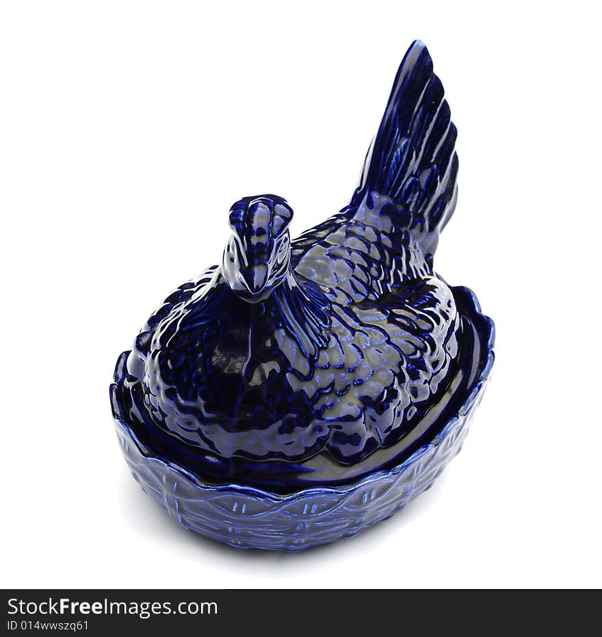 Shot of a blue china hen on white