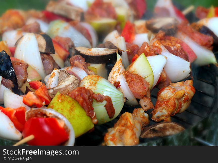 Sizzling barbecue sticks with meat and vegetables. Sizzling barbecue sticks with meat and vegetables