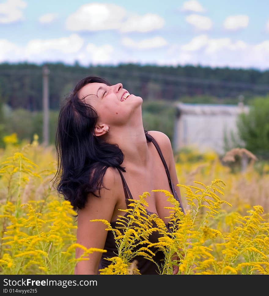 Revelry of the young woman. Beautifully, when woman smiles and rejoices