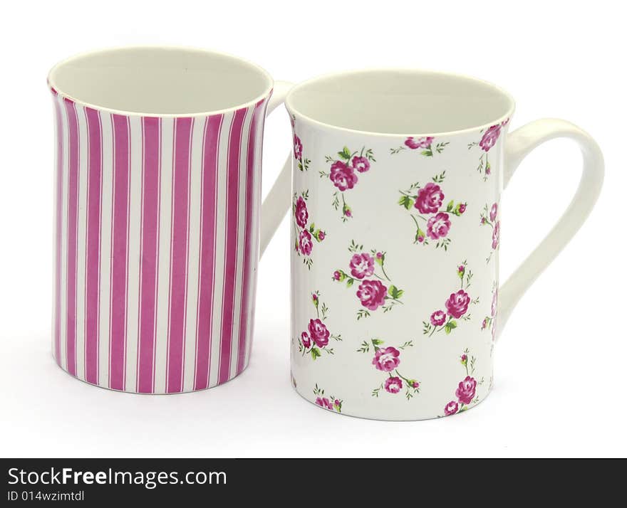 Shot of a two pretty mugs on white. Shot of a two pretty mugs on white