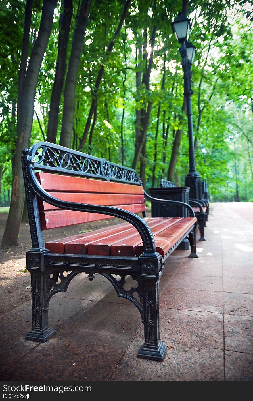 Old-fashioned bench in city park