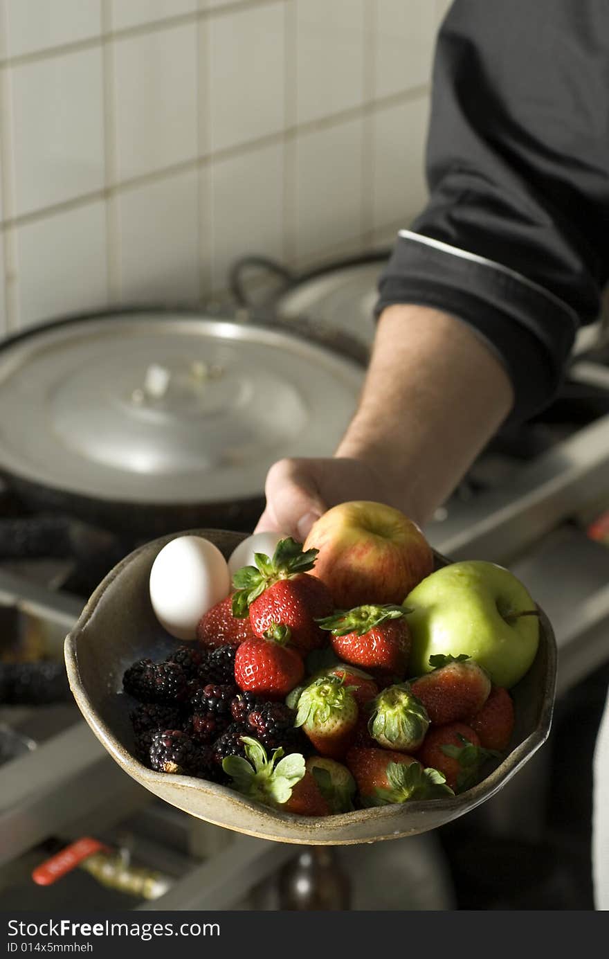 Chef Holding Fruit