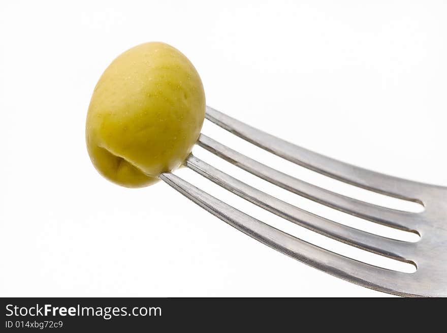 Fresh Green Olive In A Fork