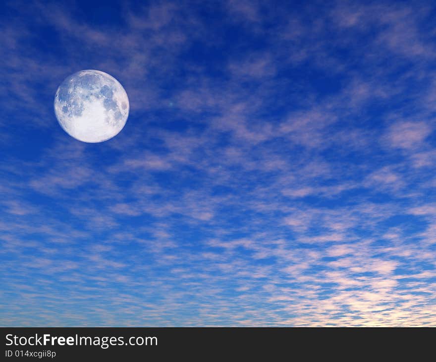 Full moon on a cloud sky background