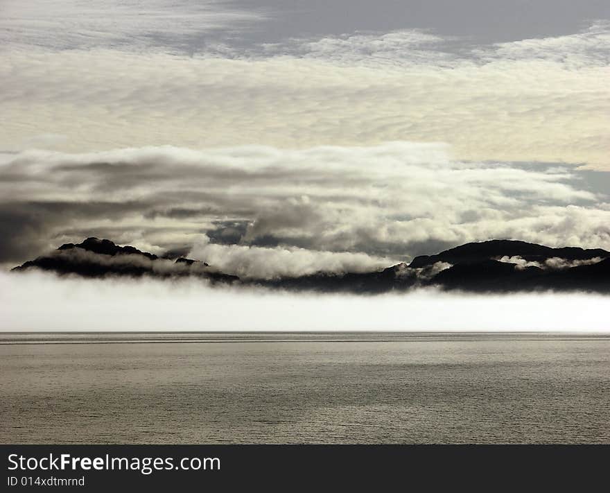 Foggy and cloudy landscape in Alaska. Foggy and cloudy landscape in Alaska.