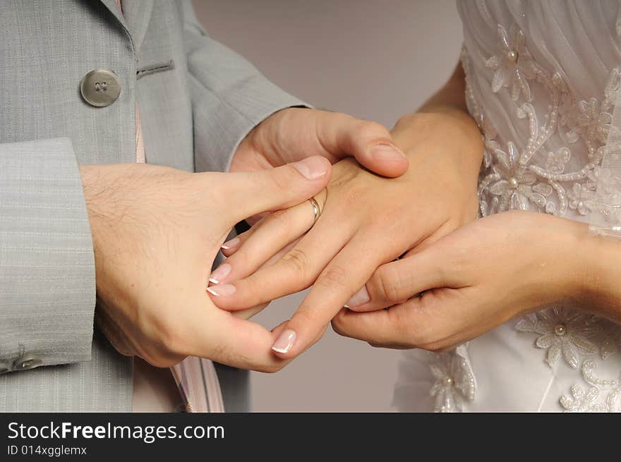 Wedding rings exchange between groom and bride