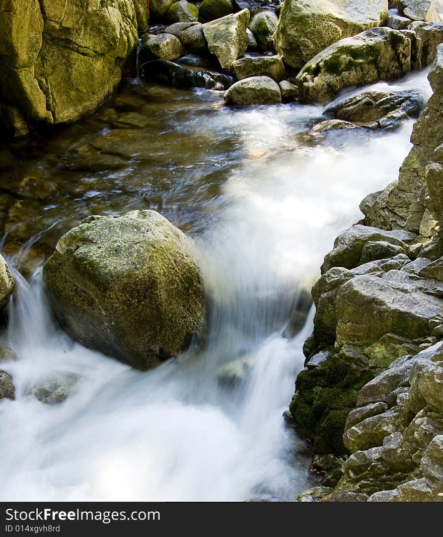 Lolaia waterfall in Retezat Mountains, Romania.