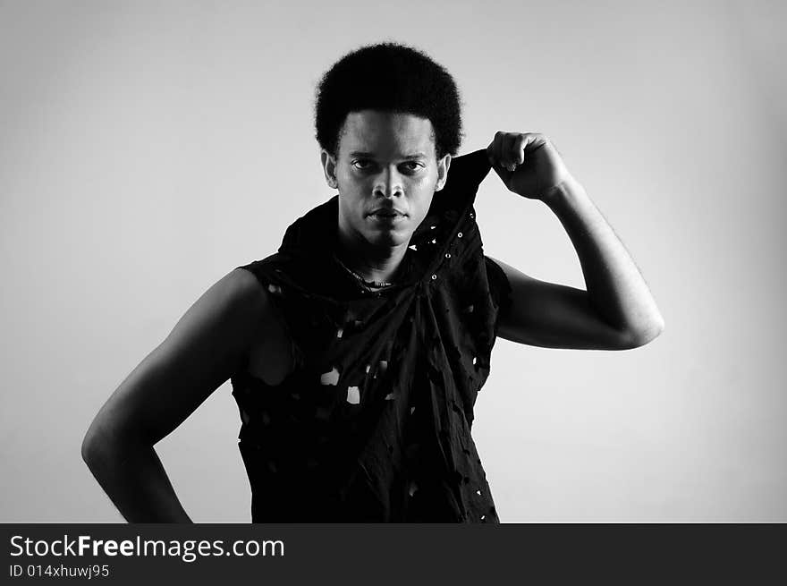 Black and white portrait of young trendy african man posing - isolated. Black and white portrait of young trendy african man posing - isolated