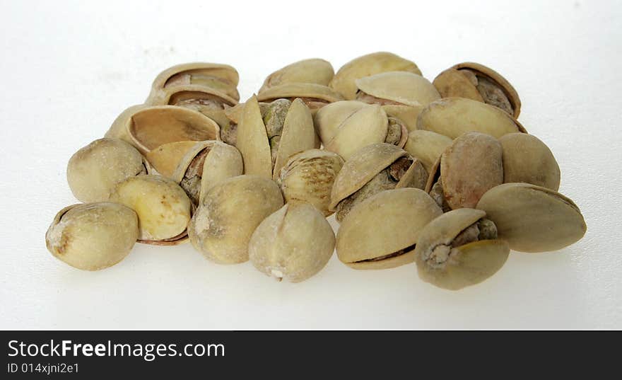 Pistachios, in their shell, on a table