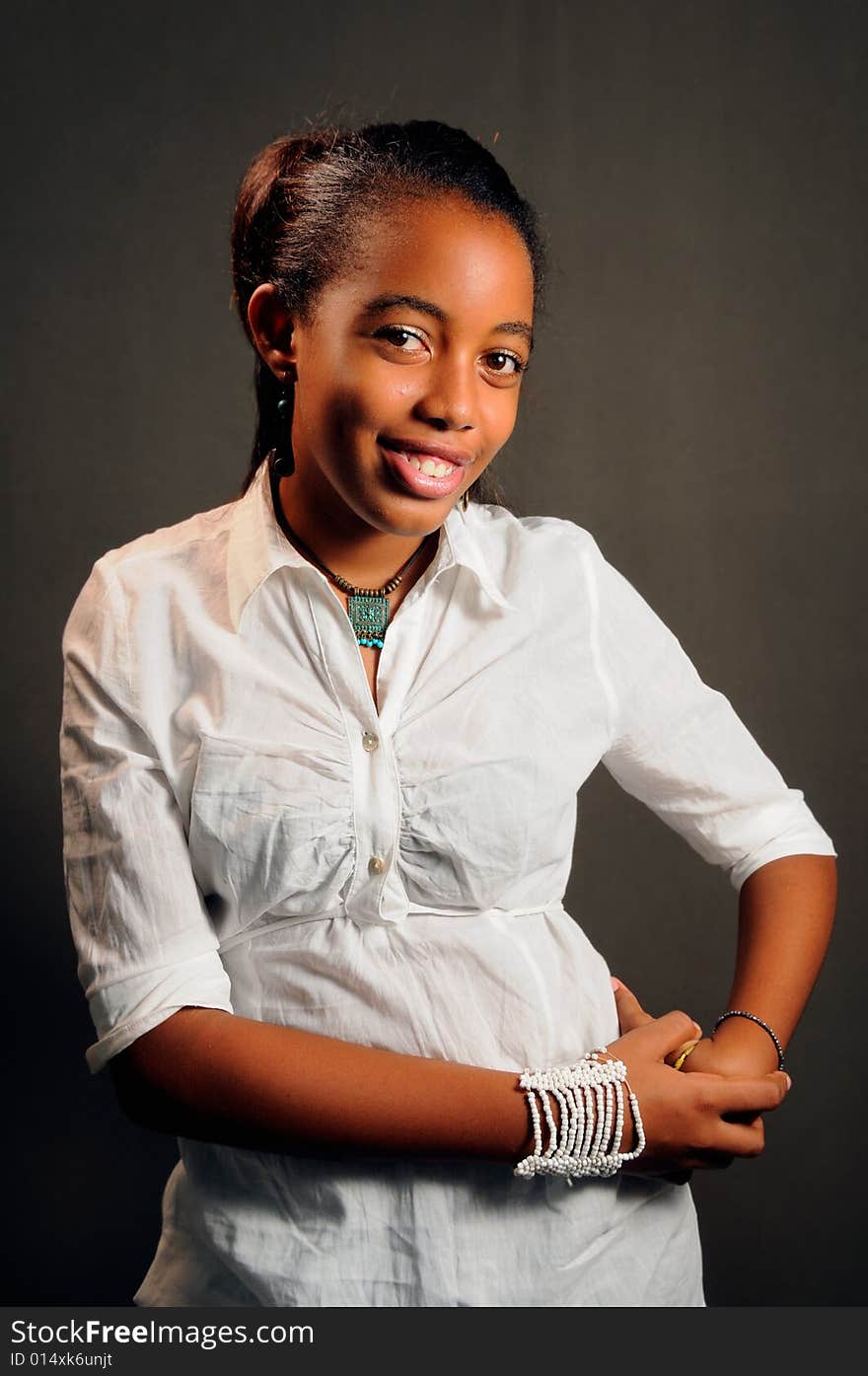 Portrait of young cheerful african teen girl posing. Portrait of young cheerful african teen girl posing