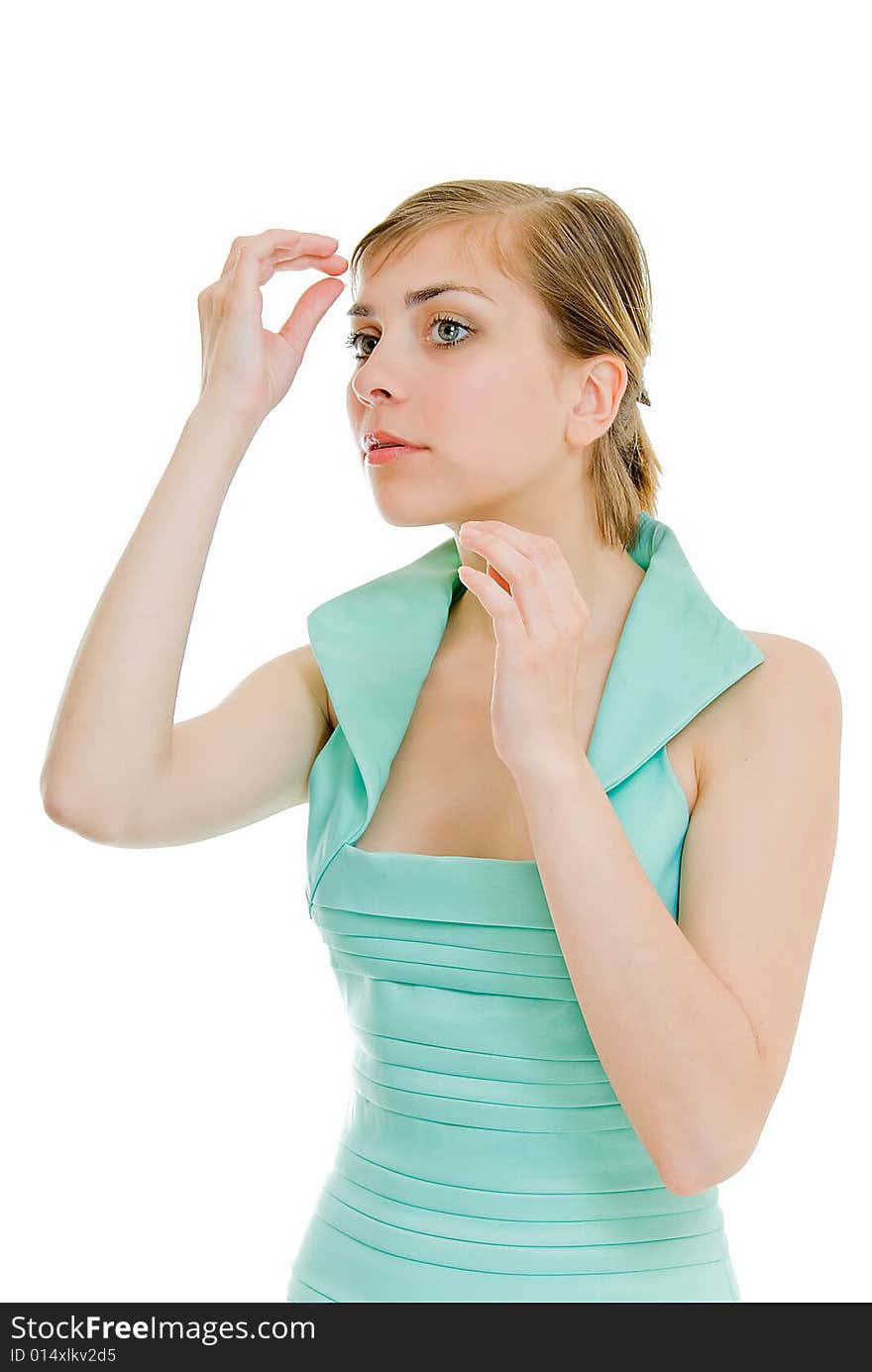 Young lady adjusting yours hair. Young lady adjusting yours hair