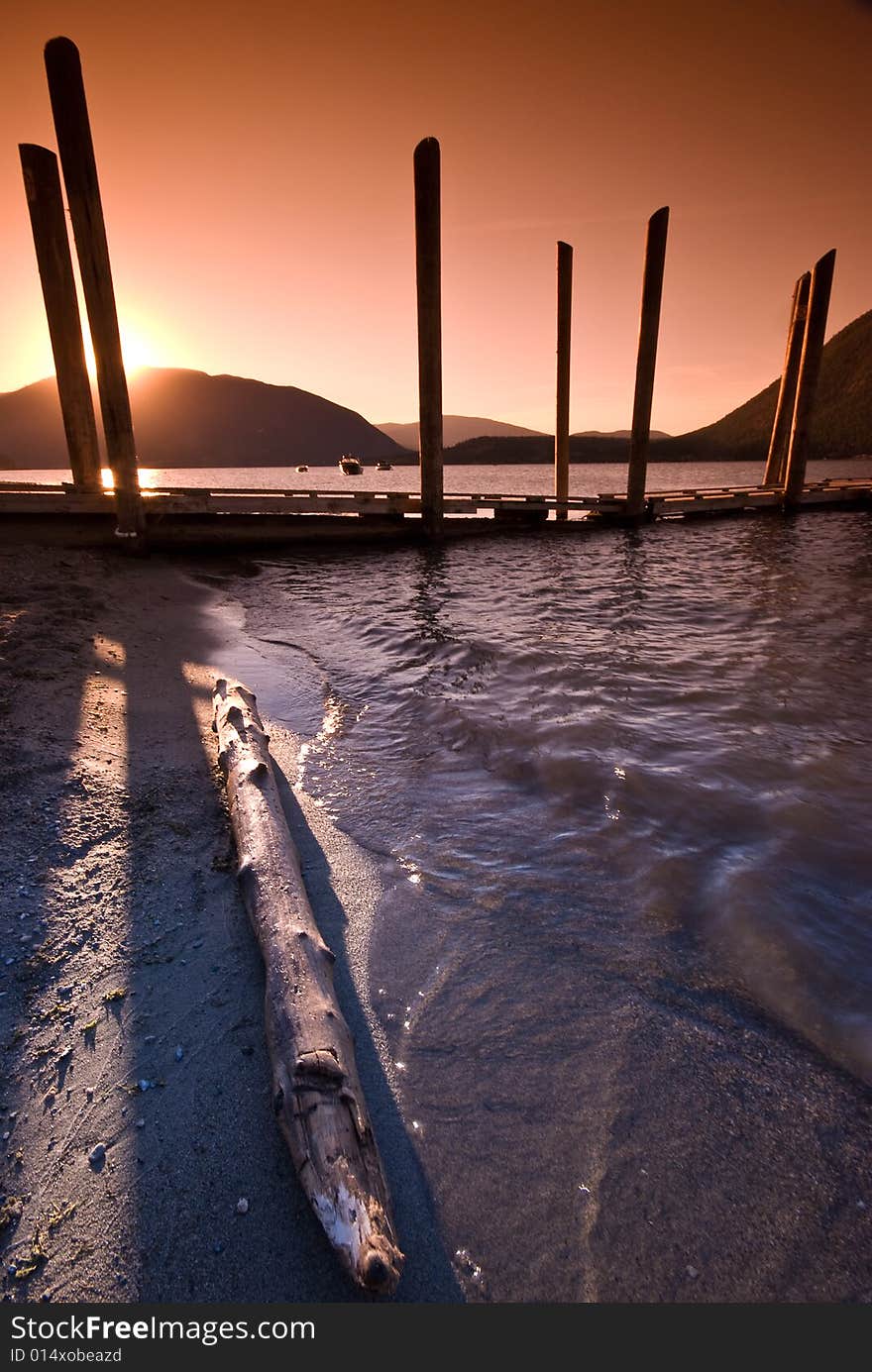 Sunset over Shuswap Lake boardwalk, Salmon Arm, British Columbia, Canada. Sunset over Shuswap Lake boardwalk, Salmon Arm, British Columbia, Canada.