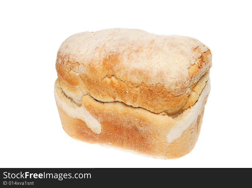 Freshly baked crusty farmhouse loaf of bread on white. Freshly baked crusty farmhouse loaf of bread on white