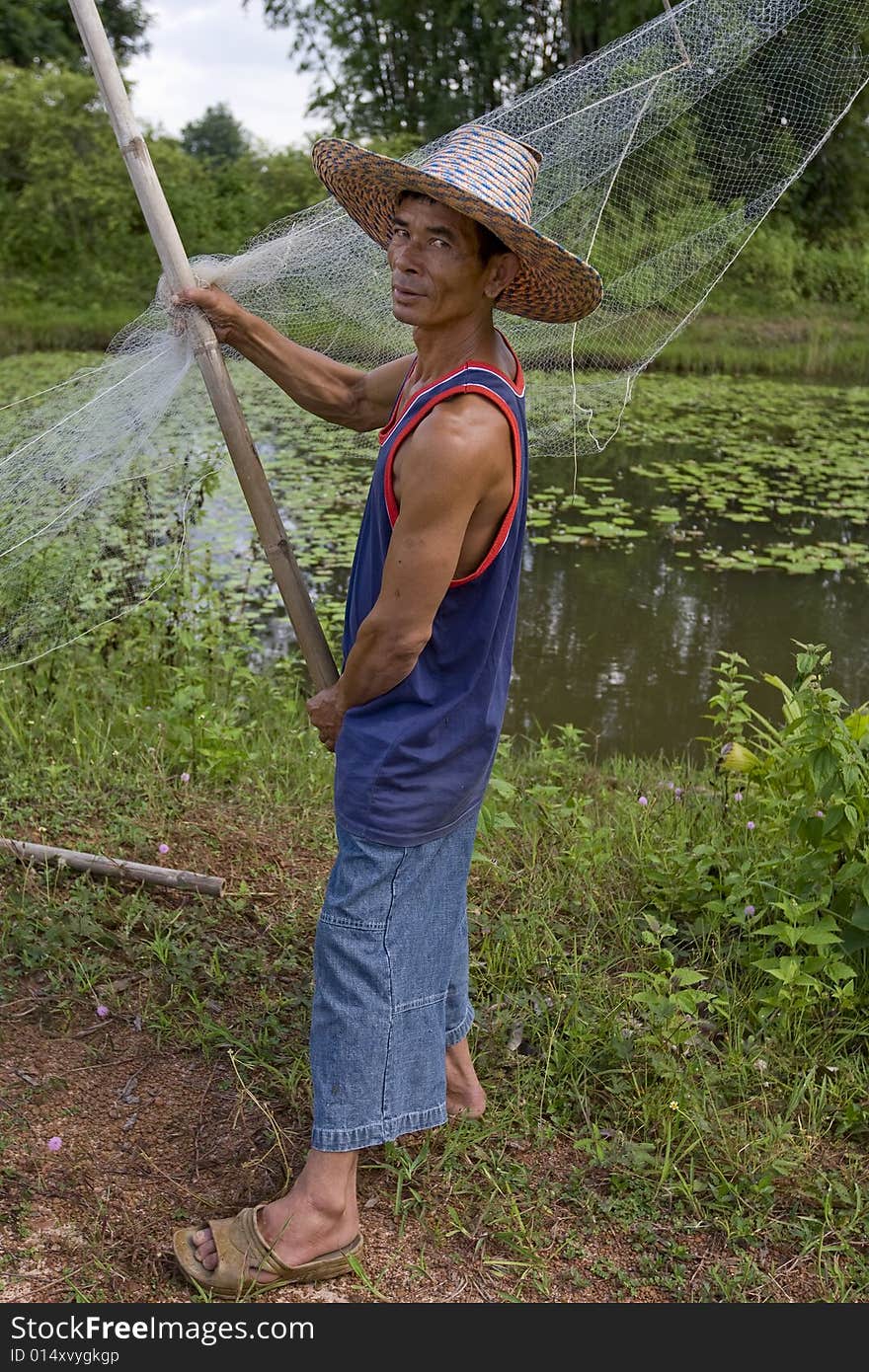 Fisherman with stave, Asia