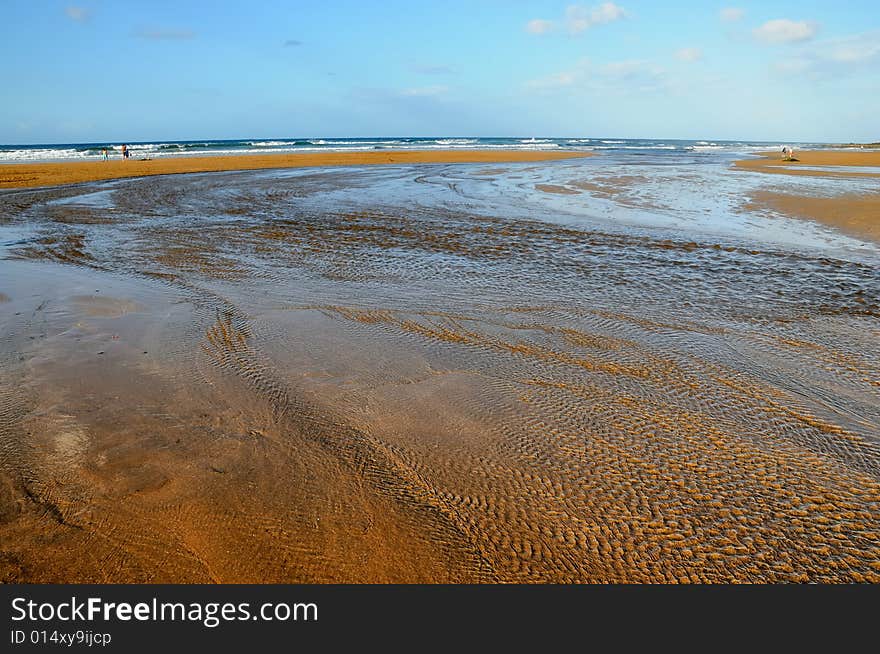 Coast at the sea with waves at the horizon. Coast at the sea with waves at the horizon