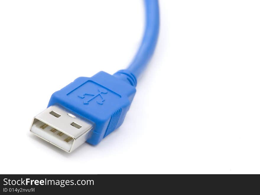 Close Up / Macro of a Blue Computer USB Cable on an Isolated Background. Close Up / Macro of a Blue Computer USB Cable on an Isolated Background