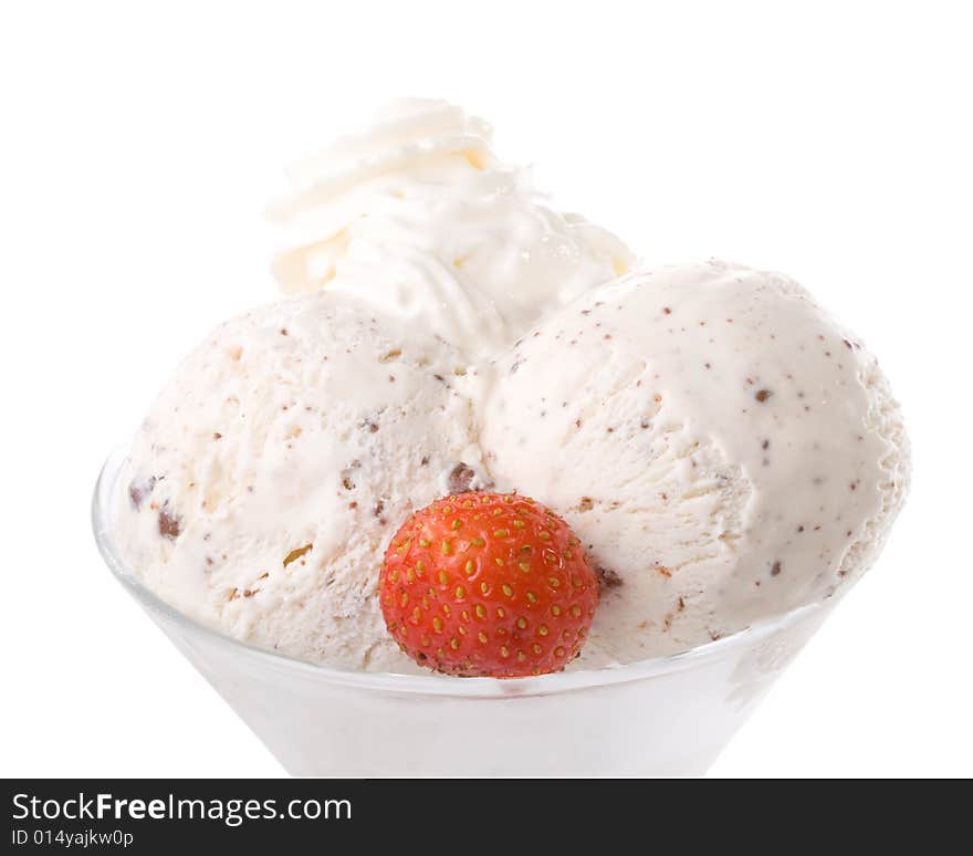 Ice-cream with a strawberries in a glass on a white background.